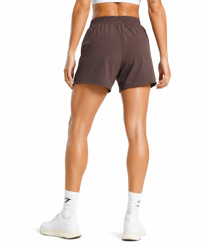 Woven Pocket Shorts by GYMSHARK